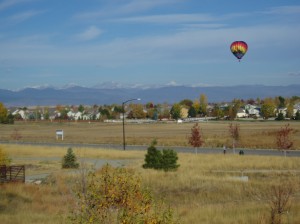 Hot Air Balloon landing by Harris Ct. House